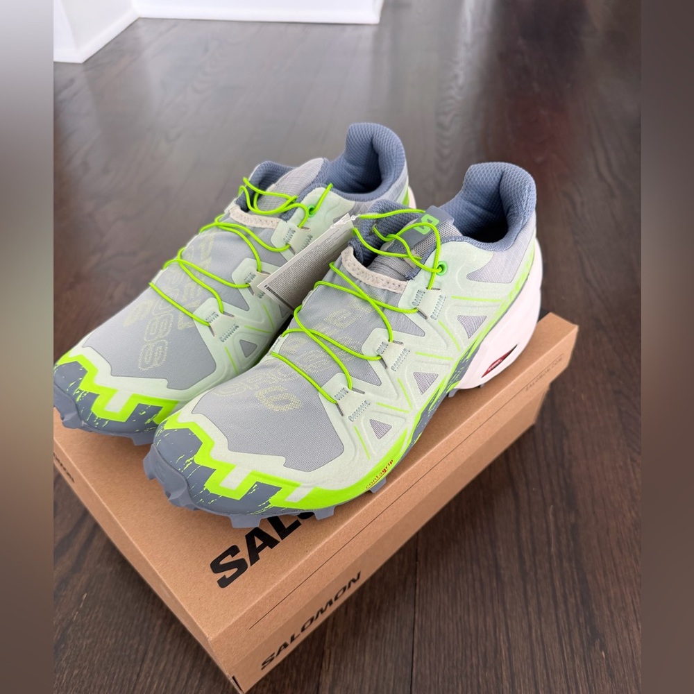 Salomon White, Gray and Neon Green Speedcross 6 Running Sneakers.